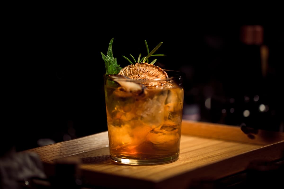 Close-up of drinks and glassware at a bar